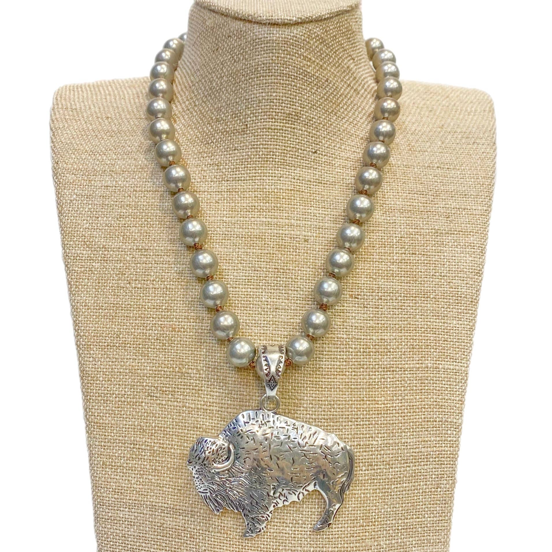 Silver Metal Buffalo Pendant on Faux Navajo Pearl Necklace